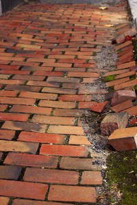 bigstockphoto_Cracked_Brick_Walkway_5948916 bigstockphoto_Cracked_Brick_Walkway_5948916